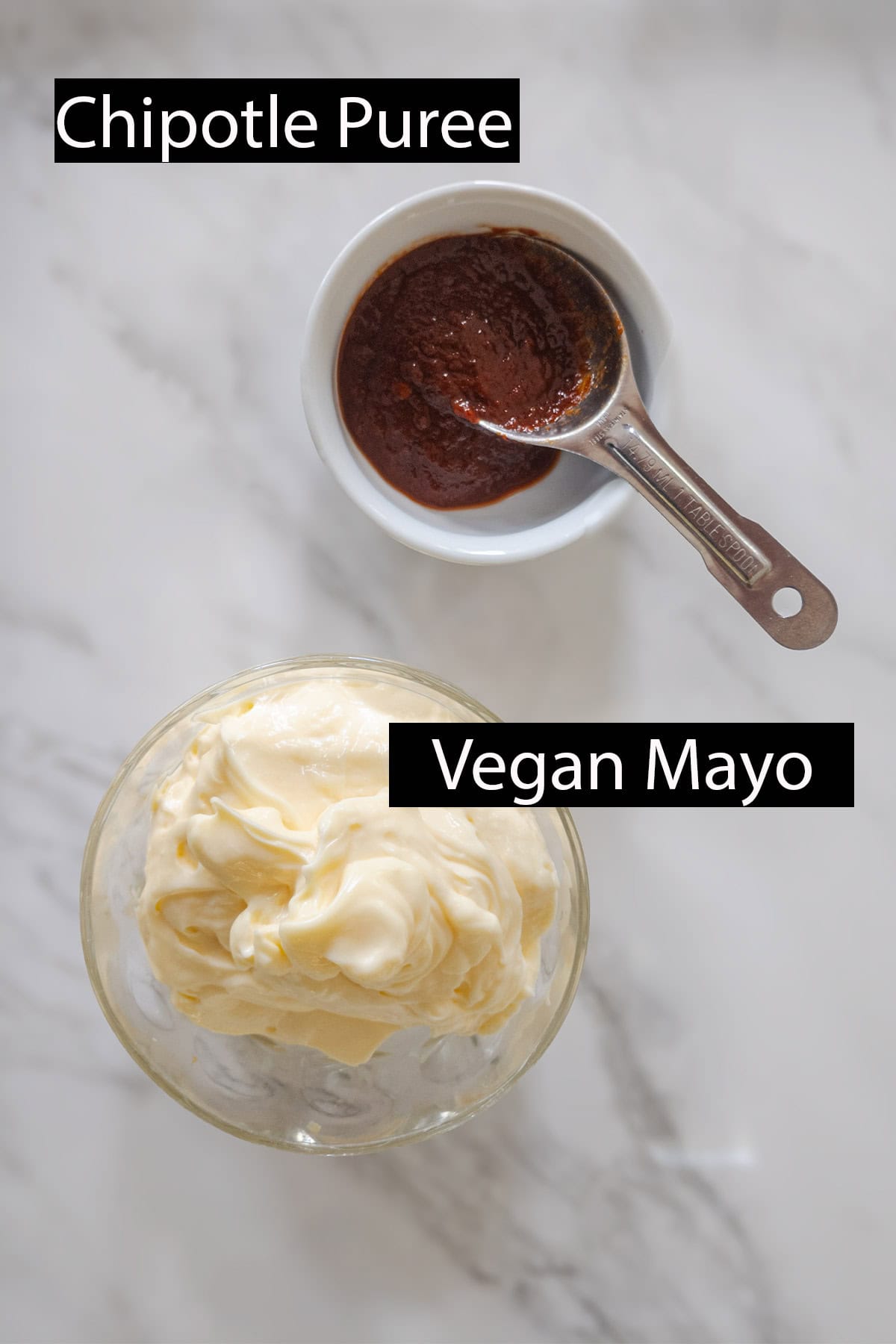 A dish of vegan mayo and chipotle puree.