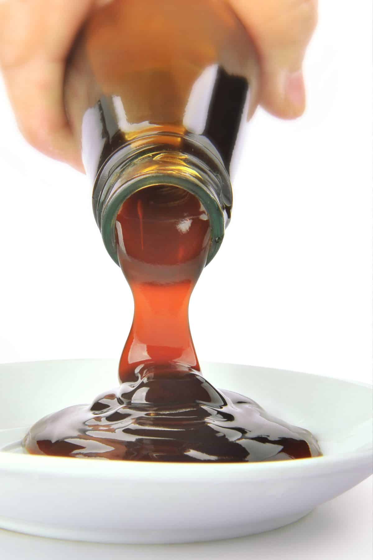 oyster sauce being poured